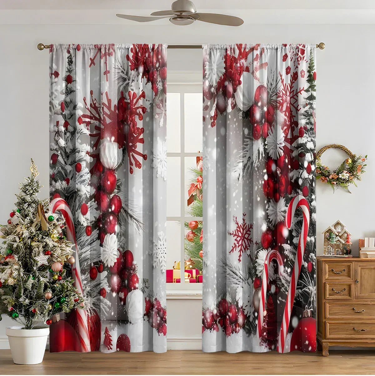 Festive Christmas print curtains with red and white ornaments, candy canes, and snowflake patterns in a cozy living room.