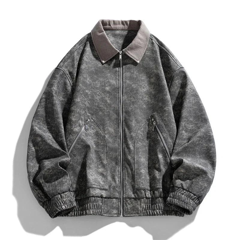 Oversized gray washed bomber jacket with zip closure, elastic cuffs, and side zip pockets.