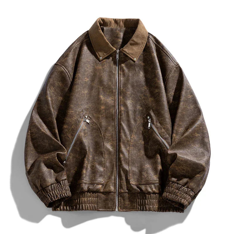 Brown vintage-style bomber jacket with zippered pockets, relaxed fit, and textured material