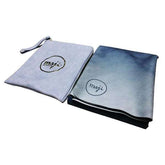 Aqua blue suede rubber mat with a soft finish, folded next to a matching zip pouch.