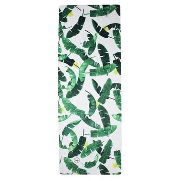 White suede travel mat with green tropical leaf print, rectangular shape