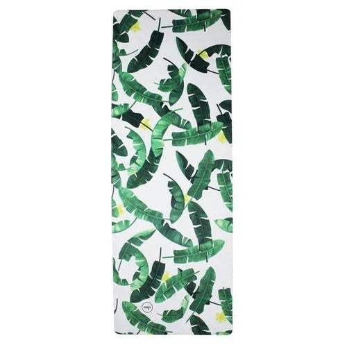 White travel mat with green leafy print, soft suede surface, rectangular shape