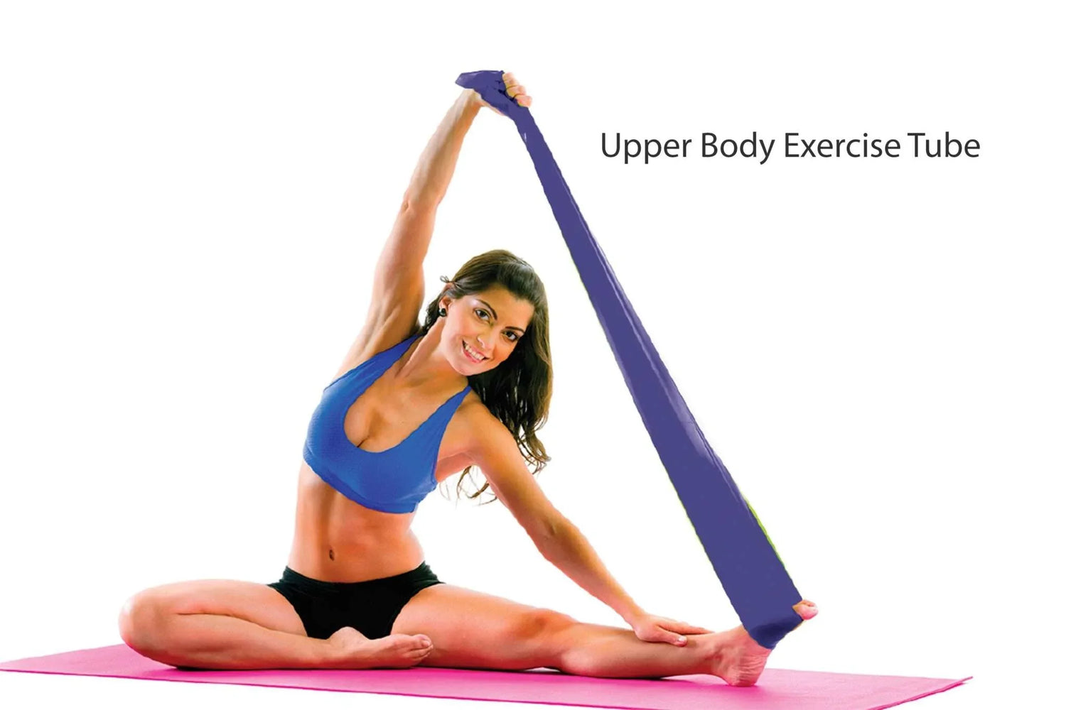 Woman in blue sports bra and black shorts stretching with purple exercise tube on pink mat