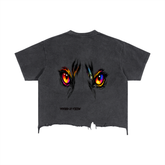 Black t-shirt with colorful eye design on a white background