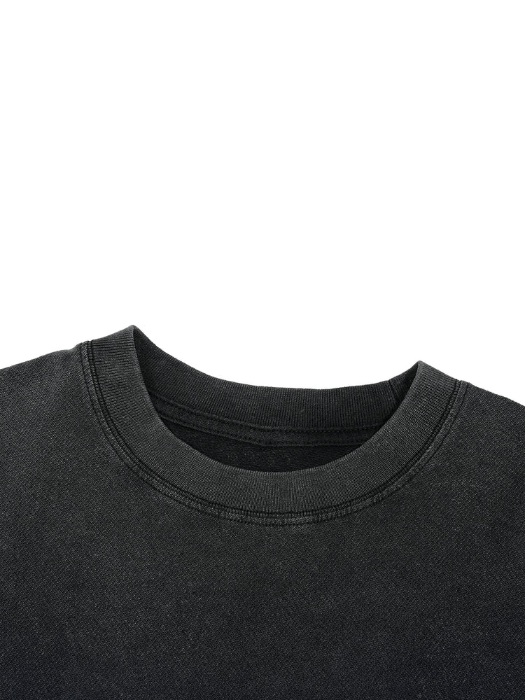 Close-up of a black sweatshirt collar on a white background