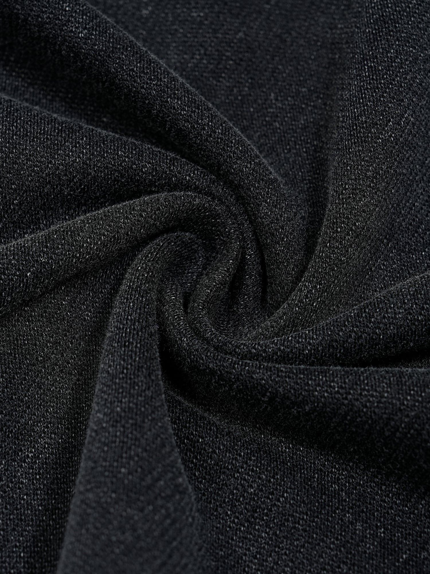 Close-up of black fabric with a textured pattern