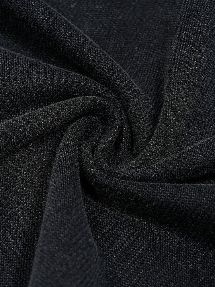Close-up of black fabric with a textured pattern