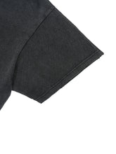 Close-up of a dark gray fabric texture on a white background