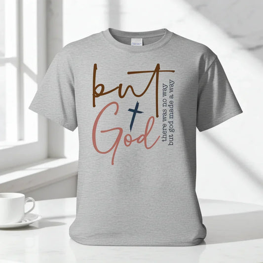 Light gray unisex t-shirt with bold multicolor inspirational text graphic, relaxed fit, cotton material.
