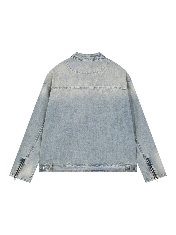 Light blue denim jacket on a white background