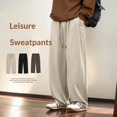 Loose fit beige sweatpants with drawstring, soft fabric, casual streetwear style