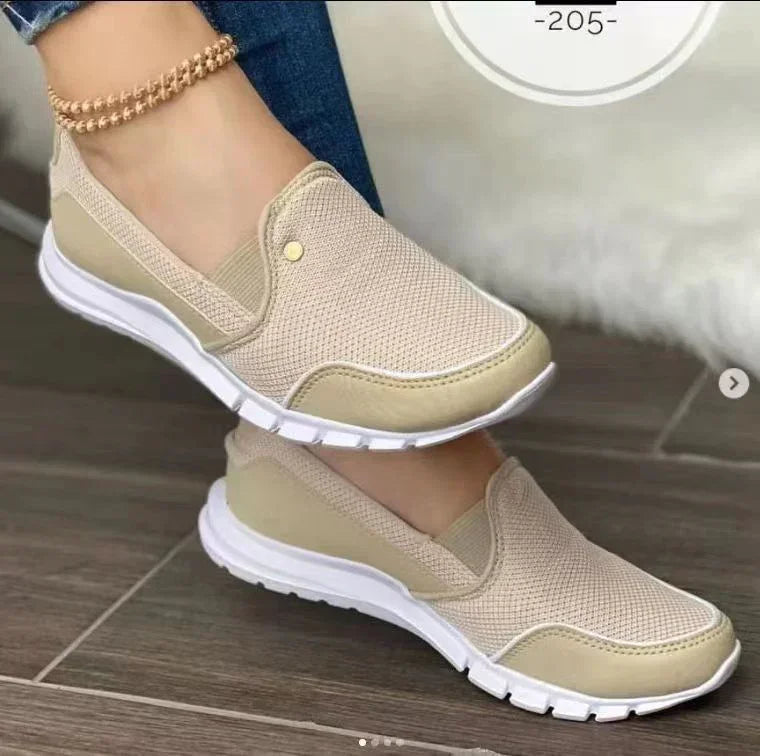 Beige slip-on mesh sneakers with white soles, casual fit, lightweight breathable design