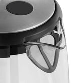 Close-up of a modern kettle lid with stainless steel top and built-in mesh filter
