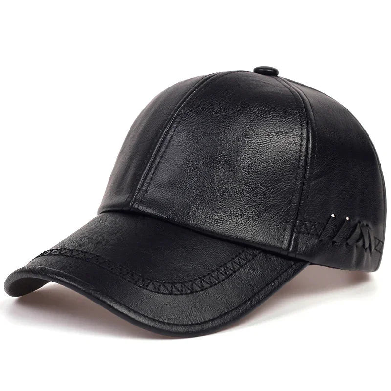 Black faux leather baseball cap with stitched details and curved brim, streetwear style