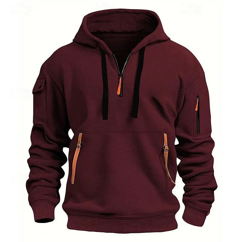 Burgundy streetwear hoodie with zip pockets, tech details, relaxed fit, cotton blend