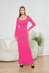 Woman in a fitted hot pink long sleeve maxi dress with square neckline, ribbed material