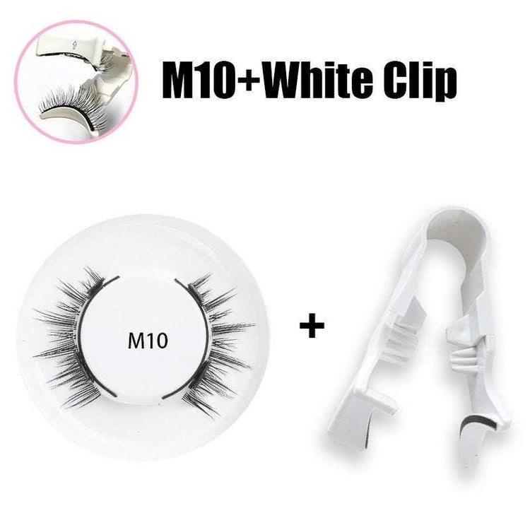 False eyelashes in black with natural volume, paired with a white plastic applicator clip.