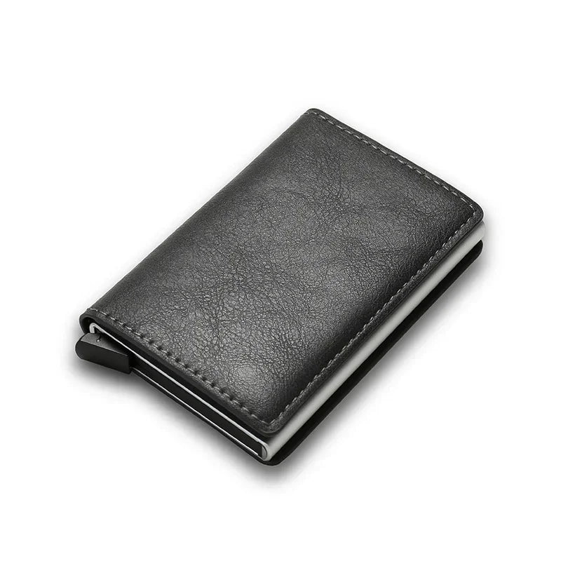 Slim black leather wallet with textured finish and minimalist design