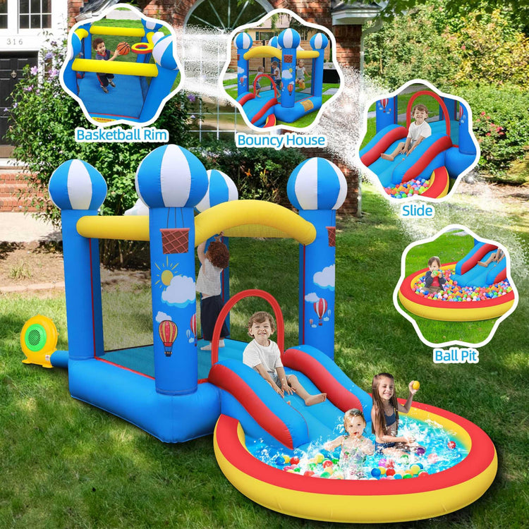 Colorful kids inflatable bounce house with blue and yellow slide, basketball hoop, and ball pit.