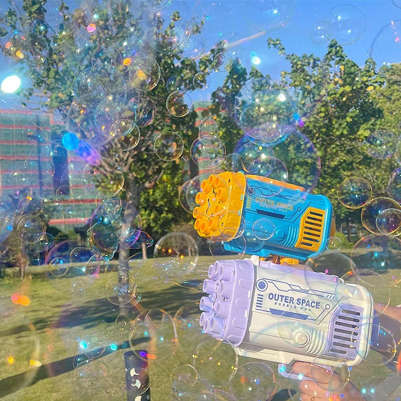 Colorful plastic bubble guns with blue, yellow, white, and purple details in a park setting