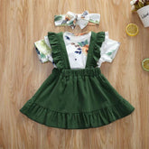 Floral short-sleeve top with green ruffle pinafore dress and matching headband, cotton blend, relaxed fit.