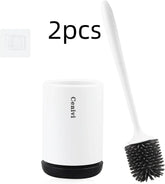 White silicone toilet brush with holder, black bristles, and wall mount, modern bathroom design