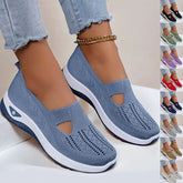 Light blue breathable slip-on knit sneakers, round toe, white soles, casual fit, multiple color options.