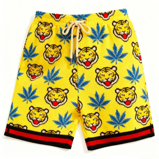 Yellow knit shorts with blue leaf and tiger head pattern, relaxed fit, red-black trim