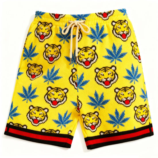Yellow knit shorts with blue leaf and tiger head pattern, relaxed fit, red-black trim