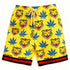 Yellow streetwear knit shorts with blue leaf and tiger head pattern, elastic waist, relaxed fit.