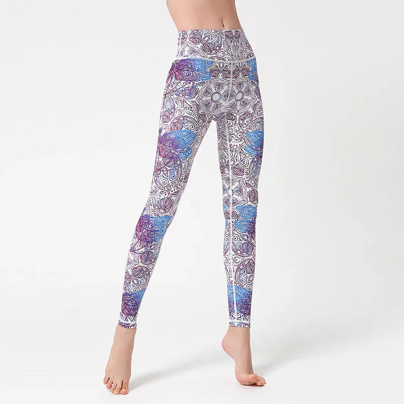 High-waisted fitted leggings with blue and purple mandala pattern on white fabric