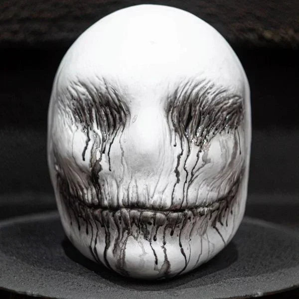 White sculpted mask with black dripping streaks, gothic streetwear accessory, matte finish