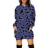 Woman wearing a loose-fit purple hoodie dress with black bat print and long sleeves