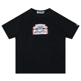 Black oversized streetwear t-shirt with bold front graphic and short sleeves, cotton material