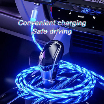 Glowing blue LED charging cable in car interior near gear shift, tech accessory for vehicles