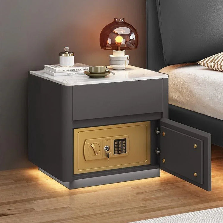 Modern bedside table with marble top, gray body, built-in gold safe, and LED lighting