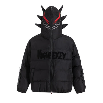 Black puffer jacket with graphic monster hood, red eyes, spikes, and streetwear fit