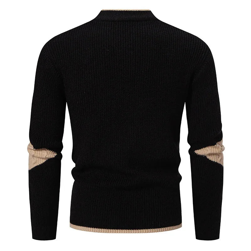 Black knit sweater with beige accents on hem and elbows, regular fit, long sleeves.
