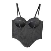 Black structured bustier top with adjustable straps, sleek fitted design, and smooth satin finish