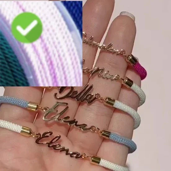 Hand holding pastel rope bracelets with gold name charms, soft colors, adjustable fit