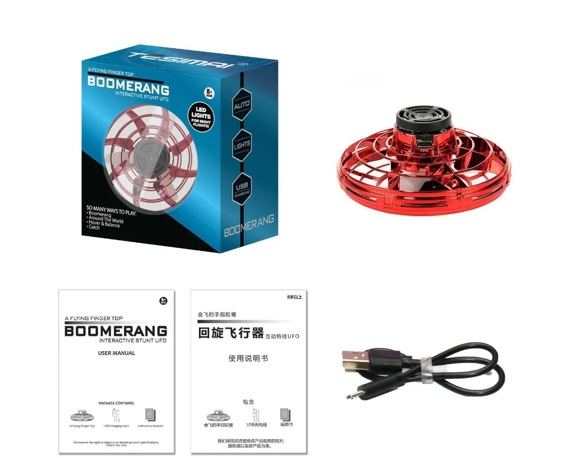 Red interactive stunt UFO toy with LED lights, USB charging cable, box, and user manuals.