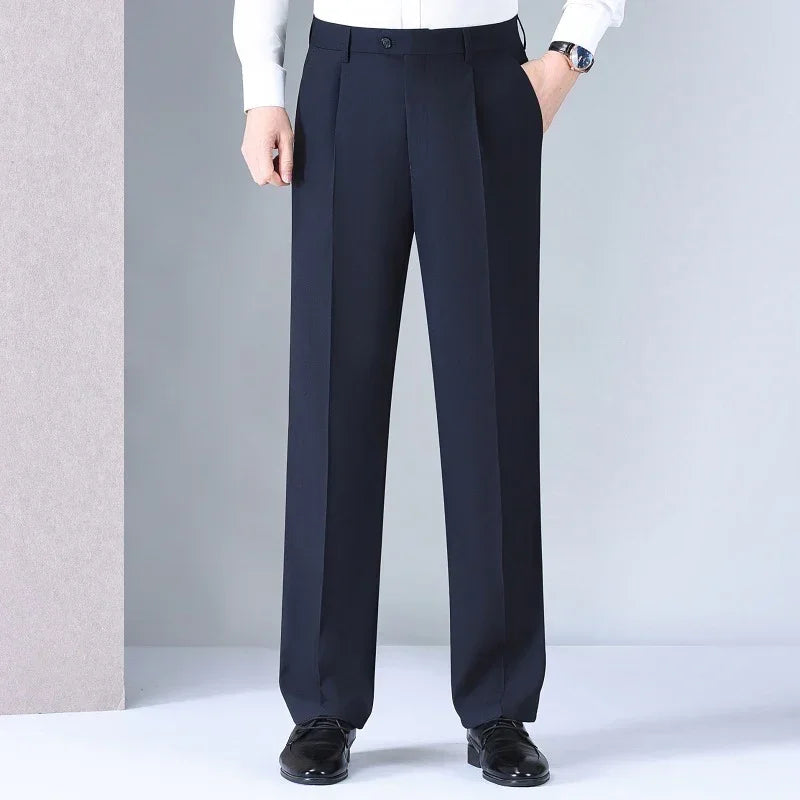 Men's straight-leg navy dress pants with crease, classic fit, paired with white shirt
