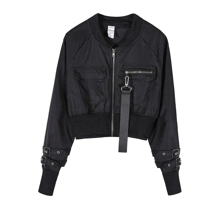 Black cropped bomber jacket with front zipper, utility pockets, buckle straps on sleeves, and relaxed fit