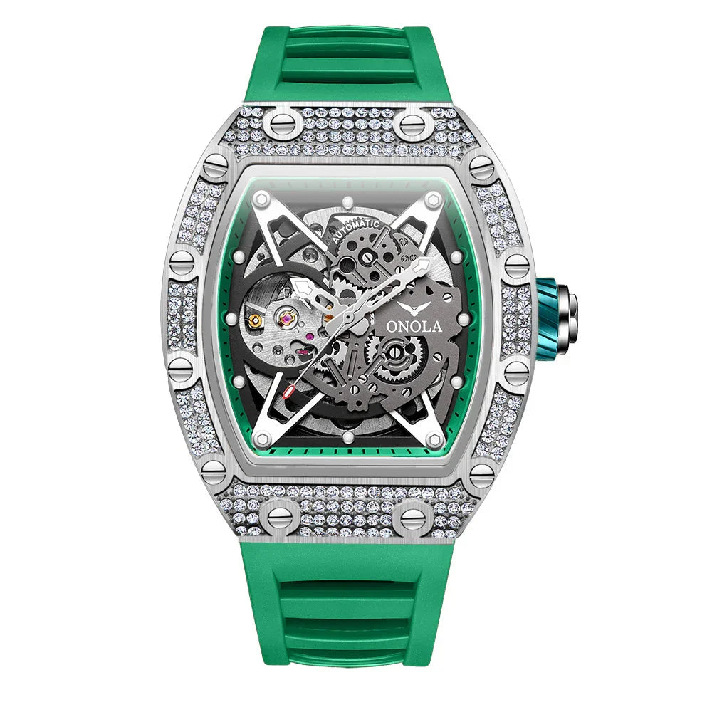 Green silicone strap watch with crystal-studded silver case, skeleton dial, and automatic movement.