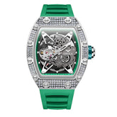 Green silicone strap watch with crystal-studded silver case, skeleton dial, and automatic movement.
