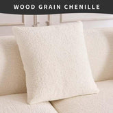 Cream wood grain chenille throw pillow on matching textured sofa in modern room