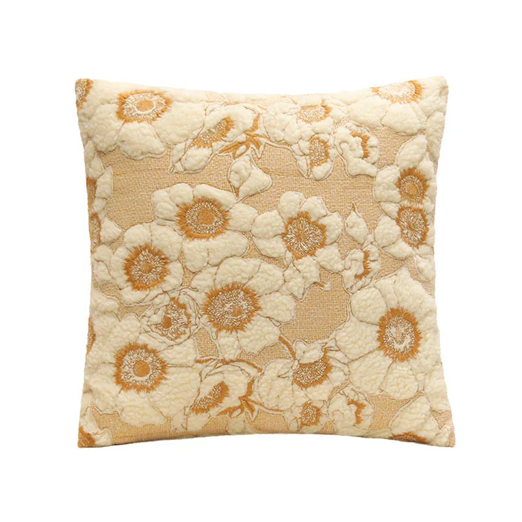 Cream and beige floral embroidered throw pillow with soft textured fabric and square shape