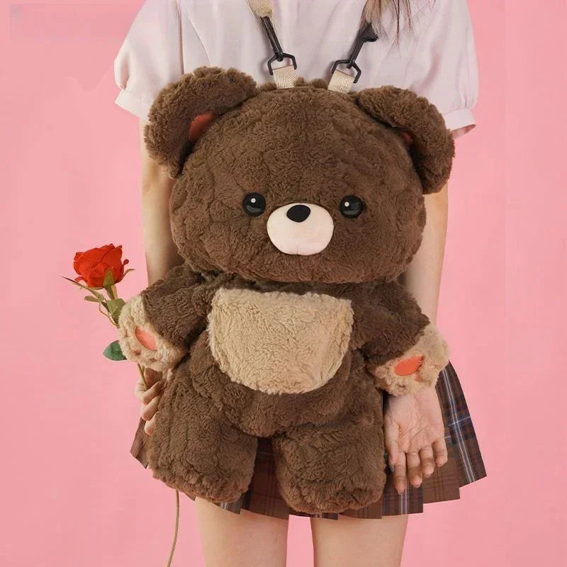 Girl wearing a brown plush teddy bear backpack with plaid skirt, holding a red rose