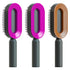Three oval hair brushes with black handles and pink or brown glossy plastic frames