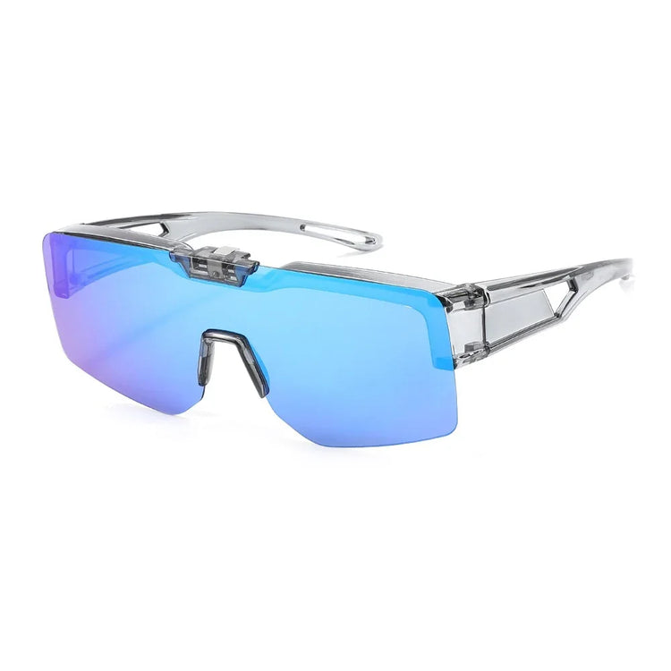Futuristic streetwear sunglasses with blue mirrored lens and clear geometric frame